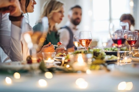People eating an evening meal